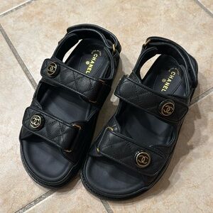 Black Quilted Leather Sandals with Gold-Tone Accents